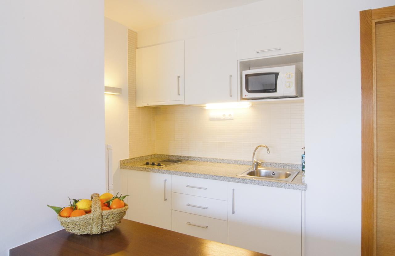 Apartamentos Bon Lloc Санта Еулалия дел Рио Екстериор снимка